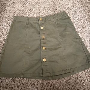 Olive green skirt with gold button detailing